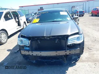 2016 Chrysler 300 Anniversary Edition with VIN 2C3CCARG7GH230414, listed as a IAAI auction lot 41853857 with 84,639 mi miles and . Bid and sale history available at DreamBid. Image 12.
