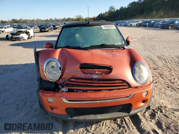 2007 MINI Convertible S with VIN WMWRH33587TJ43499, listed as a Copart auction lot 76266684 with 103,691 mi miles and Salvage title. Bid and sale history available at DreamBid. Image 5.