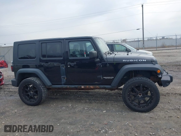 2008 Jeep Wrangler Rubicon with VIN 1J8GA69128L547347, listed as a IAAI auction lot 41985787 with 151,461 mi miles and . Bid and sale history available at DreamBid. Image 13.