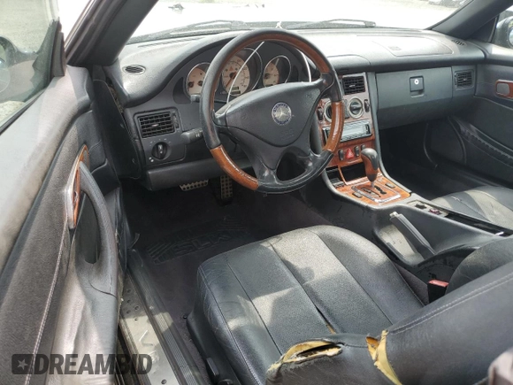 2002 Mercedes-Benz SLK 320 with VIN WDBKK65FX2F237273, listed as a Copart auction lot 61068345 with 193,304 mi miles and Salvage title. Bid and sale history available at DreamBid. Image 8.