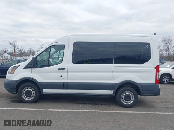 2016 Ford Transit Cargo with VIN 1FTYR1CM5GKA27058, listed as a IAAI auction lot 41753527 with 112,824 mi miles and . Bid and sale history available at DreamBid. Image 14.
