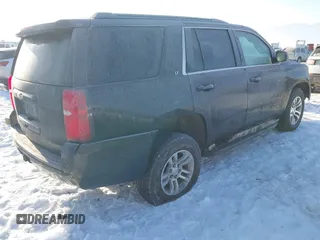 2020 Chevrolet Tahoe LT with VIN 1GNSKBKC9LR309818, listed as a IAAI auction lot 41420268 with 131,823 mi miles and . Bid and sale history available at DreamBid. Image 4.