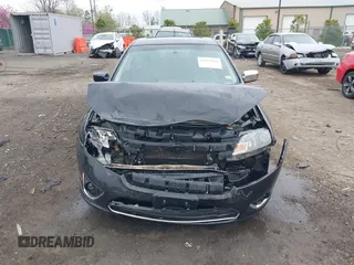 2010 Ford Fusion Hybrid with VIN 3FADP0L38AR263525, listed as a IAAI auction lot 41952084 with 112,681 mi miles. Bid and sale history available at carsss.com. Image 12.
