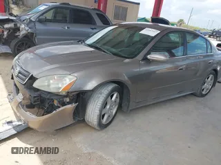 2003 Nissan Altima SE with VIN 1N4BL11D13C290488, listed as a IAAI auction lot 42357527 with 82,945 mi miles and . Bid and sale history available at DreamBid. Image 2.