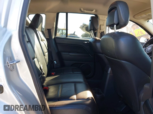 2011 Jeep Compass with VIN 1J4NT1FA4BD139153, listed as a IAAI auction lot 41665481 with 164,412 mi miles. Bid and sale history available at carsss.com. Image 8.