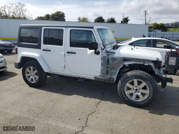 2015 Jeep Wrangler Unlimited Sahara with VIN 1C4BJWEG2FL577845, listed as a Copart auction lot 51267315 with 125,830 mi miles and Salvage Title. Bid and sale history available at carsss.com. Image 4.