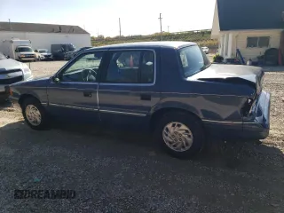 1994 Plymouth Acclaim z VIN 3P3AA46K8RT200674, wystawiony jako Copart lot #76425504 z przebiegiem 105 874 mil mil oraz Szkody całkowita. Historia ofert i sprzedaży dostępna na DreamBid. Obrazek 2.