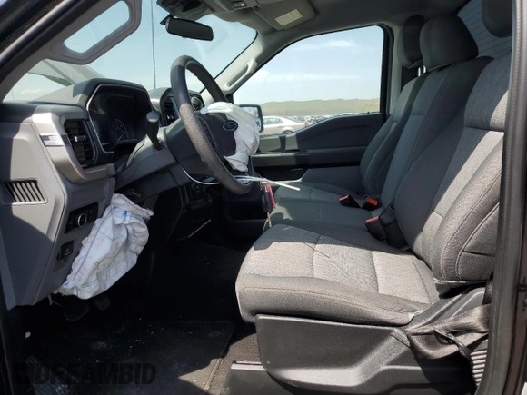 2021 Ford F-150 XL with VIN 1FTMF1CB4MKF09005, listed as a Copart auction lot 53935765 with 52,332 mi miles and Salvage title. Bid and sale history available at DreamBid. Image 7.