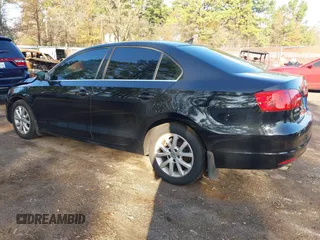 2014 Volkswagen Jetta Sedan SE w/Connectivity with VIN 3VWD07AJ8EM427848, listed as a IAAI auction lot 40988647 with 134,773 mi miles. Bid and sale history available at carsss.com. Image 3.