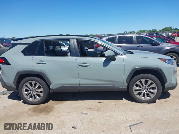 2021 Toyota RAV4 XLE Premium with VIN 2T3C1RFV0MW140682, listed as a IAAI auction lot 42315813 with 98,267 mi miles and . Bid and sale history available at DreamBid. Image 13.