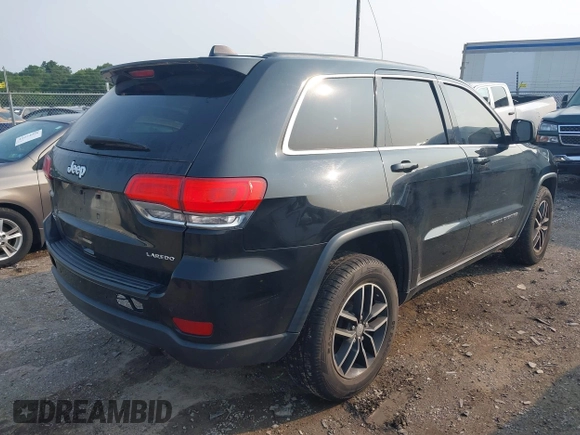2017 Jeep Grand Cherokee Laredo with VIN 1C4RJFAG0HC706155, listed as a IAAI auction lot 42452967 with 144,925 mi miles and . Bid and sale history available at DreamBid. Image 4.