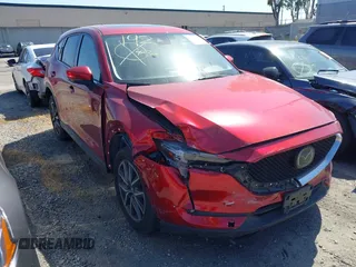 2018 Mazda CX-5 Grand Touring with VIN JM3KFBDM2J0333017, listed as a IAAI auction lot 41850431 with 85,000 mi miles. Bid and sale history available at carsss.com. Image 1.