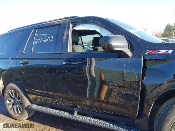 2021 Chevrolet Tahoe Z71 with VIN 1GNSKPKD1MR460353, listed as a IAAI auction lot 41427602 with 56,635 mi miles. Bid and sale history available at carsss.com. Image 12.