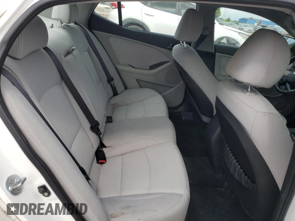 2013 Kia Optima LX z VIN KNAGM4A76D5372356, wystawiony jako Copart lot #57652125 z przebiegiem Nie podano mil oraz Szkoda całkowita • Salvage title. Historia ofert i sprzedaży dostępna na DreamBid. Obrazek 10.