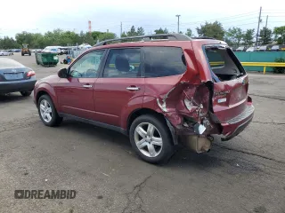 2009 Subaru Forester X with VIN JF2SH63609H795510, listed as a Copart auction lot 61041205 with 218,834 mi miles and Salvage title. Bid and sale history available at DreamBid. Image 2.