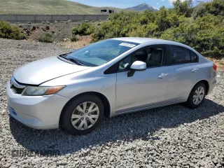 2012 Honda Civic LX z VIN 19XFB2F53CE373385, wystawiony jako Copart lot #51335755 z przebiegiem 188 159 mil mil oraz Szkoda całkowita • Salvage title. Historia ofert i sprzedaży dostępna na DreamBid. Obrazek 1.