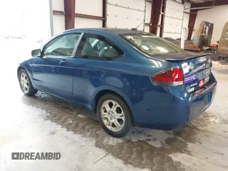 2009 Ford Focus SE with VIN 1FAHP32N09W244420, listed as a IAAI auction lot 41952030 with 165,886 mi miles. Bid and sale history available at carsss.com. Image 3.