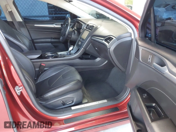 2014 Ford Fusion Titanium с VIN 3FA6P0SU3ER126548, выставлен на аукционе IAAI как лот 42634957 с пробегом 111 580 миль миль и . История ставок и продаж доступна на DreamBid. Изображение 5.