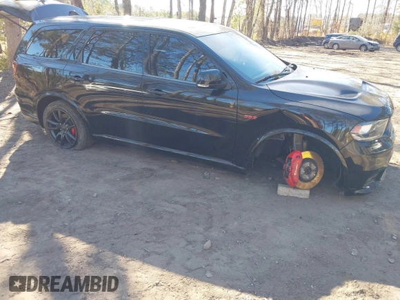2018 Dodge Durango SRT with VIN 1C4SDJGJ6JC416538, listed as a IAAI auction lot 41440038 with 67,650 mi miles and . Bid and sale history available at DreamBid. Image 6.