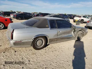 2000 Cadillac Eldorado Touring with VIN 1G6ET1295YU145248, listed as a Copart auction lot 82160574 with 87,294 mi miles and Salvage Title. Bid and sale history available at DreamBid. Image 3.