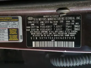 2012 Kia Sorento LX with VIN 5XYKTDA20CG297079, listed as a Copart auction lot 46606615 with 222,377 mi miles and Salvage Title. Bid and sale history available at carsss.com. Image 13.