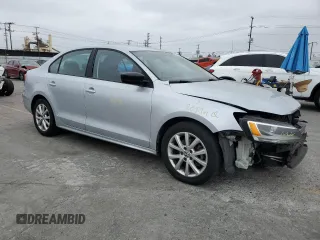 2015 Volkswagen Jetta SE with VIN 3VWD17AJ5FM285618, listed as a Copart auction lot 59930985 with 146,382 mi miles and Salvage title. Bid and sale history available at DreamBid. Image 4.