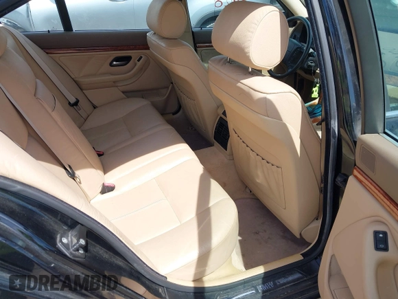 1999 BMW 5 Series 528iA with VIN WBADM6331XBY29010, listed as a IAAI auction lot 42103420 with 196,575 mi miles. Bid and sale history available at carsss.com. Image 8.