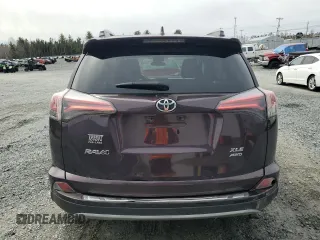 2018 Toyota RAV4 XLE with VIN 2T3RFREV2JW841670, listed as a Copart auction lot 50700675 with Not Provided miles and Salvage Title. Bid and sale history available at DreamBid. Image 6.