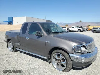 2003 Ford F-150 XL with VIN 1FTRX07233KC40260, listed as a Copart auction lot 78007404 with 85,222 mi miles and Salvage Title. Bid and sale history available at carsss.com. Image 4.