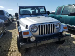 2004 Jeep Wrangler Sport with VIN 1J4FA49SX4P776775, listed as a Copart auction lot 74946824 with Not Provided miles and Salvage Title. Bid and sale history available at carsss.com. Image 5.