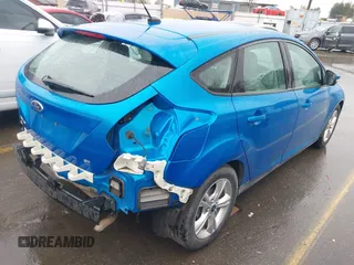 2014 Ford Focus SE z VIN 1FADP3K23EL162634, wystawiony jako IAAI lot #41772913 z przebiegiem 113 405 mil mil oraz . Historia ofert i sprzedaży dostępna na DreamBid. Obrazek 4.