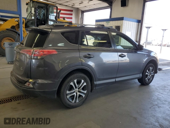 2018 Toyota RAV4 LE with VIN JTMBFREV9JJ743672, listed as a Copart auction lot 62510955 with 141,971 mi miles and Salvage title. Bid and sale history available at DreamBid. Image 3.