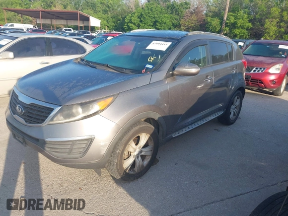 2013 Kia Sportage LX z VIN KNDPB3A26D7406680, wystawiony jako IAAI lot #42004413 z przebiegiem 170 221 mil mil oraz . Historia ofert i sprzedaży dostępna na DreamBid. Obrazek 2.