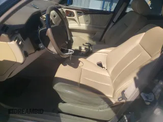 1997 Mercedes-Benz E-Class with VIN WDBJF72F0VA189407, listed as a Copart auction lot 76073234 with 114,692 mi miles and Salvage Title. Bid and sale history available at carsss.com. Image 7.
