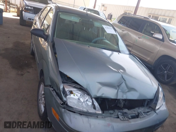 2005 Ford Focus S with VIN 1FAFP34N05W276945, listed as a IAAI auction lot 41889586 with 253,219 mi miles. Bid and sale history available at carsss.com. Image 12.