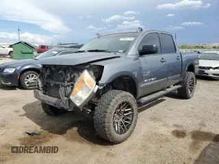 2015 Nissan Titan SL with VIN 1N6AA0ED5FN510723, listed as a Copart auction lot 60952184 with 177,435 mi miles and Salvage Title. Bid and sale history available at carsss.com. Image 1.