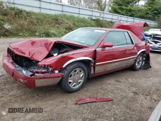2002 Cadillac Eldorado z VIN 1G6EL12Y82B102243, wystawiony jako Copart lot #72717014 z przebiegiem 165 442 mil mil oraz Czysty tytuł • Clean title. Historia ofert i sprzedaży dostępna na DreamBid. Obrazek 1.