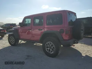2024 Jeep Wrangler Rubicon with VIN 1C4PJXFG9RW346079, listed as a Copart auction lot 77006914 with 2,446 mi miles and Salvage Title. Bid and sale history available at DreamBid. Image 2.