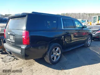 2016 Chevrolet Suburban LT with VIN 1GNSCHKC8GR452846, listed as a IAAI auction lot 41343598 with 299,610 mi miles. Bid and sale history available at carsss.com. Image 4.