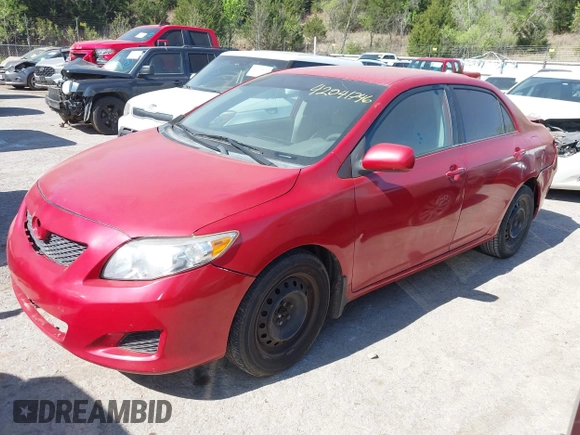 2009 Toyota Corolla with VIN 1NXBU40E09Z049359, listed as a IAAI auction lot 42041746 with 211,167 mi miles. Bid and sale history available at carsss.com. Image 2.
