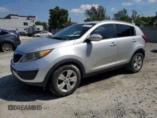 2013 Kia Sportage LX with VIN KNDPB3A26D7429389, listed as a Copart auction lot 50597295 with 217,197 mi miles and Salvage Title. Bid and sale history available at carsss.com. Image 1.
