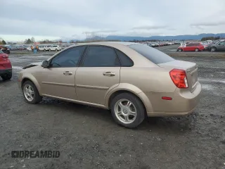 2007 Suzuki Forenza z VIN KL5JD56Z07K657218, wystawiony jako Copart lot #86767854 z przebiegiem 93 044 mil mil oraz Szkoda całkowita • Salvage title. Historia ofert i sprzedaży dostępna na DreamBid. Obrazek 2.
