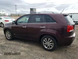 2012 Kia Sorento SX with VIN 5XYKWDA24CG283533, listed as a Copart auction lot 50073615 with 136,445 mi miles and Salvage Title. Bid and sale history available at carsss.com. Image 2.