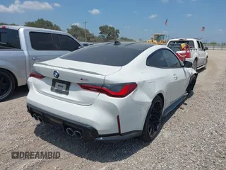 2021 BMW M4 with VIN WBS53AZ02MCH23791, listed as a IAAI auction lot 42318737 with 18,632 mi miles and . Bid and sale history available at DreamBid. Image 4.