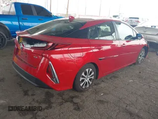 2021 Toyota Prius LE with VIN JTDKAMFP6M3189145, listed as a IAAI auction lot 42021116 with 80,722 mi miles and . Bid and sale history available at DreamBid. Image 4.