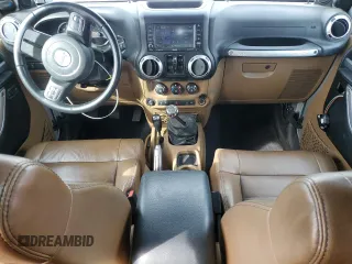 2011 Jeep Wrangler Unlimited Rubicon with VIN 1J4BA6H1XBL571187, listed as a Copart auction lot 54412505 with 83,819 mi miles and Clean title. Bid and sale history available at DreamBid. Image 8.
