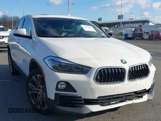 2019 BMW X2 xDrive28i with VIN WBXYJ5C57KEF82937, listed as a IAAI auction lot 41082038 with 79,749 mi miles. Bid and sale history available at carsss.com. Image 1.