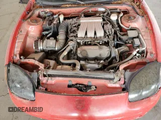 1999 Mitsubishi 3000GT z VIN JA3AM44H3XY001394, wystawiony jako Copart lot #75942814 z przebiegiem 75 146 mil mil oraz Tytuł czysty. Historia ofert i sprzedaży dostępna na DreamBid. Obrazek 11.