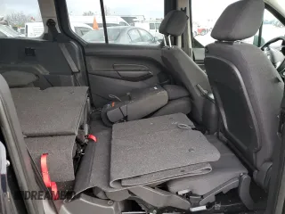 2014 Ford Transit Connect XLT z VIN NM0GE9F7XE1145781, wystawiony jako Copart lot #50659095 z przebiegiem 146 848 mil mil oraz Szkoda całkowita • Salvage title. Historia ofert i sprzedaży dostępna na DreamBid. Obrazek 11.