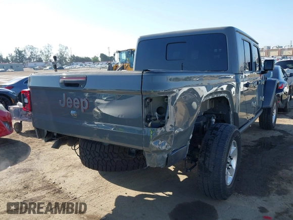 2020 Jeep Gladiator Rubicon with VIN 1C6JJTBG6LL149469, listed as a IAAI auction lot 42224826 with 58,870 mi miles and . Bid and sale history available at DreamBid. Image 4.